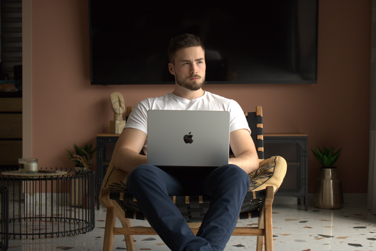 David Bruncic, founder of KST Marketing, working on a laptop